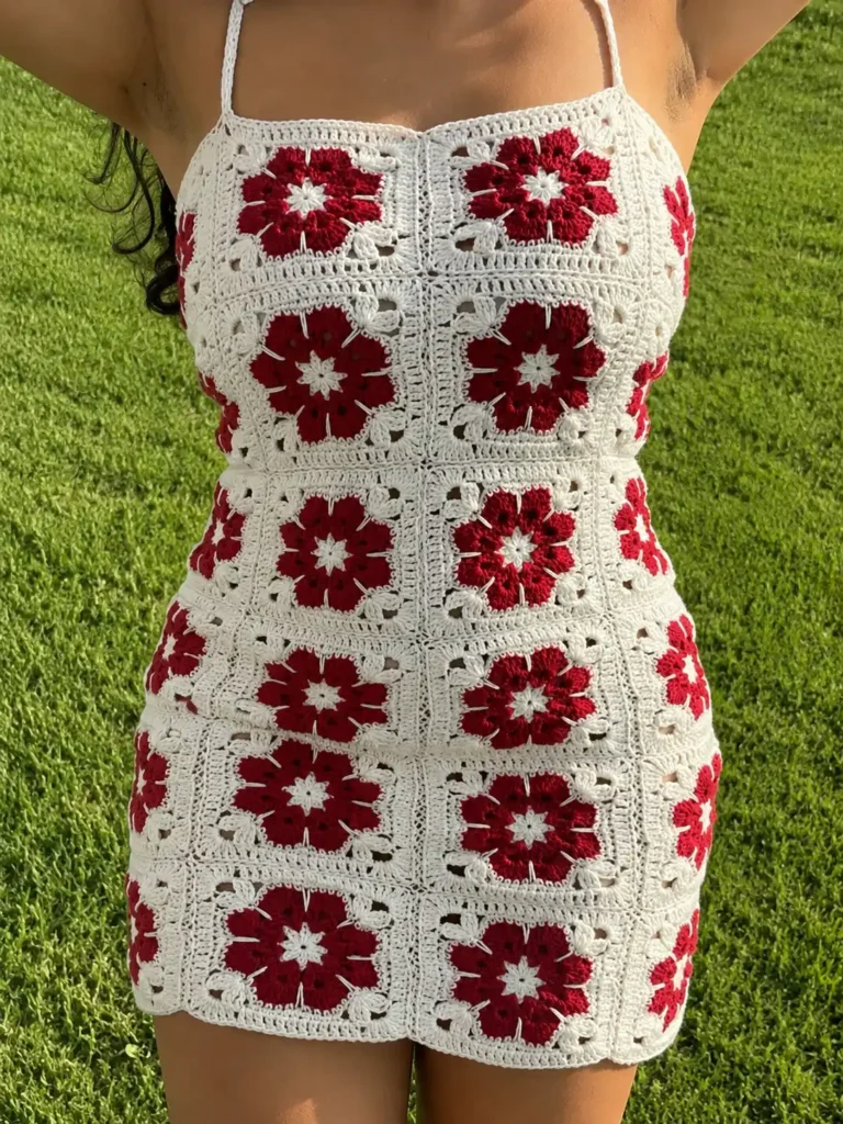 African flower granny square mini dress in red and cream worn showing fit