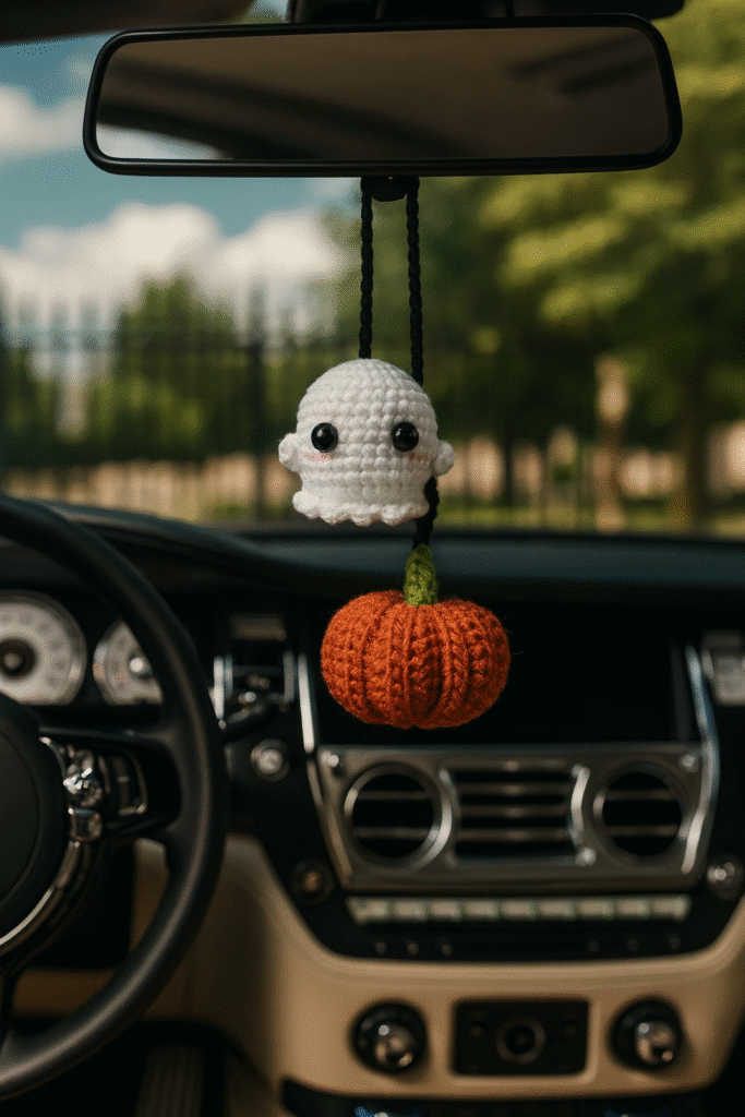 Step-by-step crochet car charm ghost pattern in progress with white yarn and hook