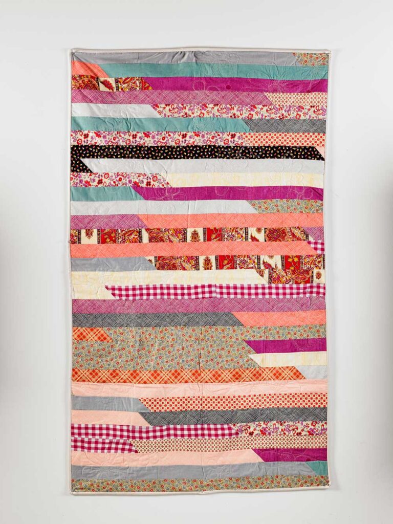Jelly Roll Quilt Patterns  – fast strip quilt made with 2.5 inch fabric strips