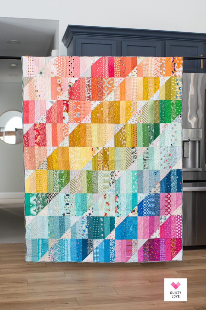 Rainbow Jelly Roll Quilt Pattern – colorful ROYGBIV quilt using fabric strips