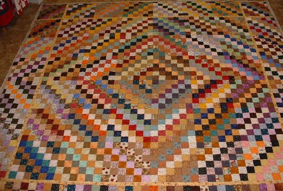 Scrappy Trip Around the World Jelly Roll Quilt Pattern – colorful travel-inspired quilt