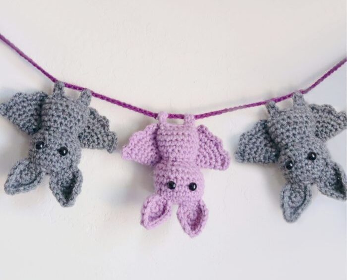 Small crochet bat appliques attached to string as Halloween garland Small crochet bat appliques attached to string as Halloween garland