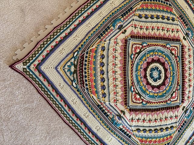 Sophie's Universe crochet blanket with textured rounds in autumn shades