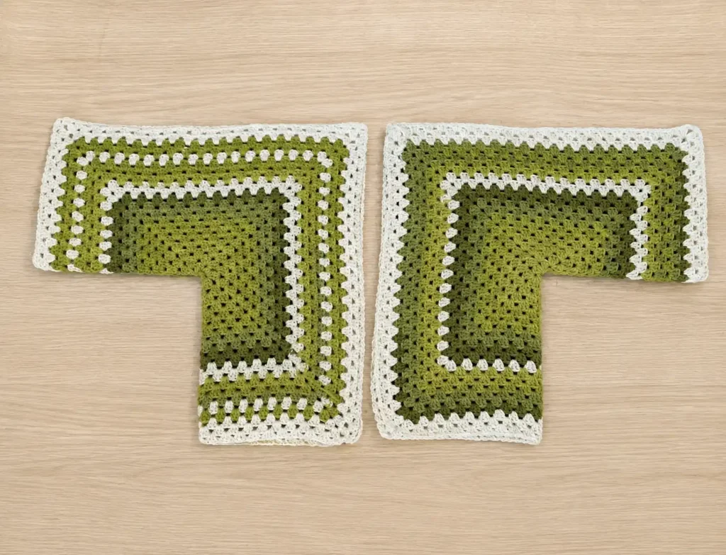 Crochet hexagon cardigan pattern - two finished hexagon halves ready to be seamed together