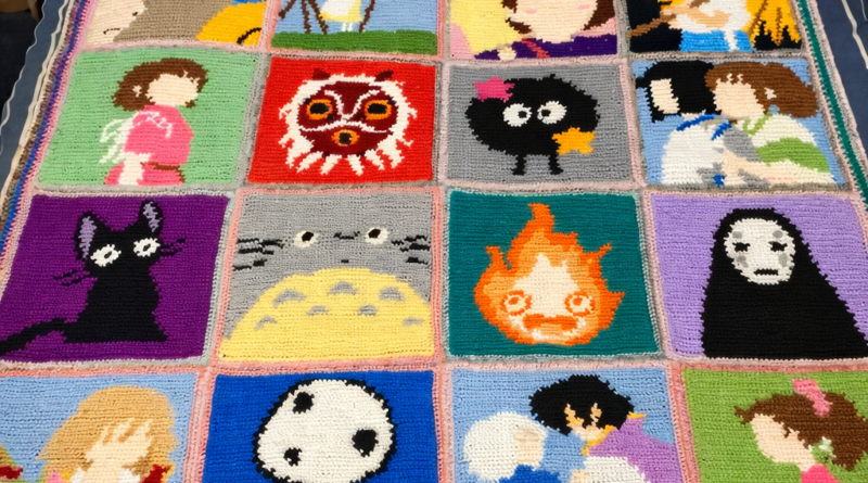 Handmade anime crochet blanket with pixel-style character squares, Ghibli inspired design, black borders and vibrant colorwork panels displayed on wooden floor.