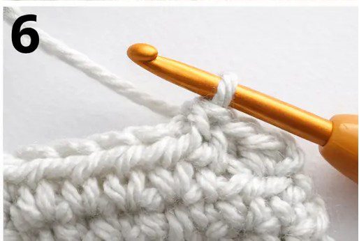Step-by-step tutorial showing how to half double crochet stitch (hdc) - 6