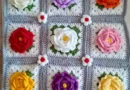 3D rose granny square crochet pattern with layered petals close-up