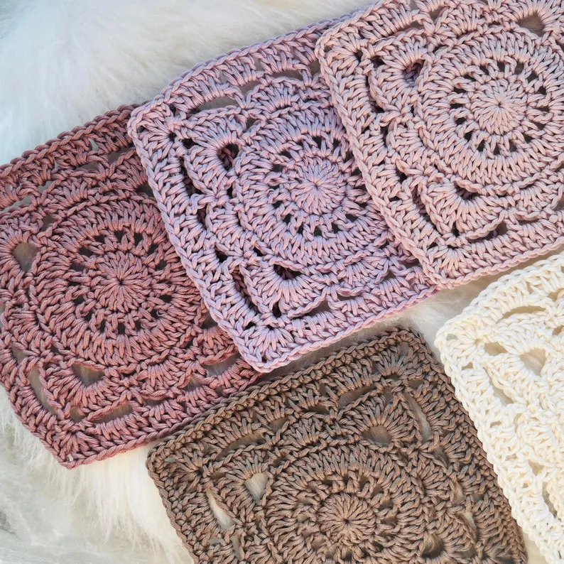 Close-up of willow granny square crochet design showing textured stitches and detailed floral motif
