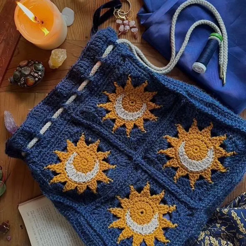Handmade celestial sun and moon granny square bag